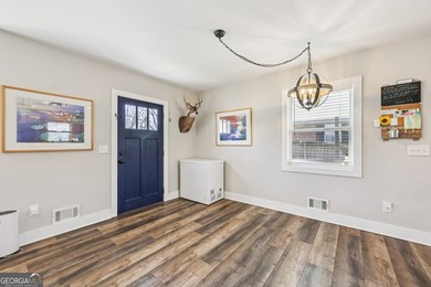 Welcome home to this fully renovated 4-sided brick ranch located - photo 5