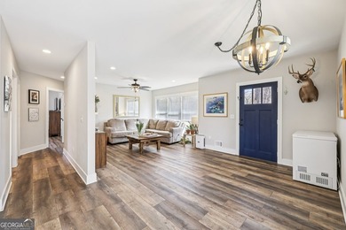 Welcome home to this fully renovated 4-sided brick ranch located - photo 6