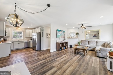 Welcome home to this fully renovated 4-sided brick ranch located - photo 9