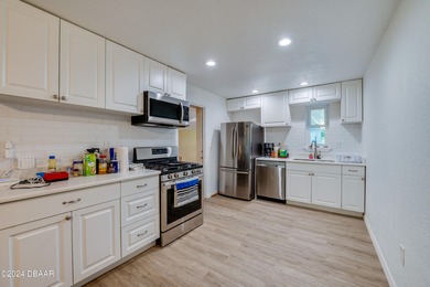 Motivated Seller! A totally renovated 4-bedroom 3- full bathroom - photo 8