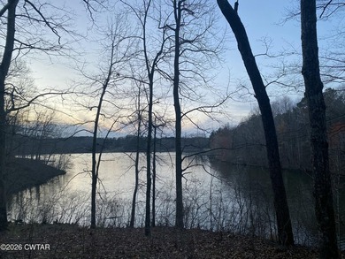 LAKEFRONT 2.2 acre lot in the gated Indian Lake Community. This - photo 1
