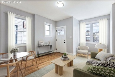JUST LISTED MOVE-IN READY SUNNY SOUTH-FACING 2-FAMILY TOWNHOUSE - photo 2