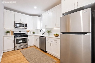 JUST LISTED MOVE-IN READY SUNNY SOUTH-FACING 2-FAMILY TOWNHOUSE - photo 3