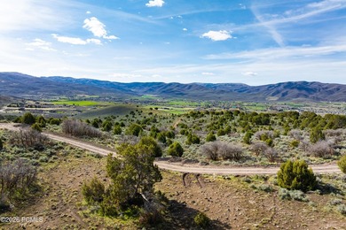 Set within the prestigious Uinta Ridge neighborhood of Red - photo 4