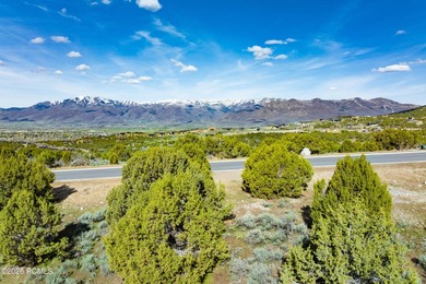 Set within the prestigious Uinta Ridge neighborhood of Red - photo 5