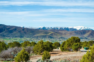 Set within the prestigious Uinta Ridge neighborhood of Red - photo 7