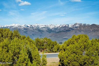 Set within the prestigious Uinta Ridge neighborhood of Red - photo 8