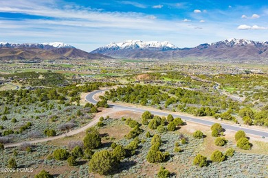 Set within the prestigious Uinta Ridge neighborhood of Red - photo 9