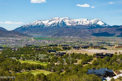 Positioned in a premier location within Red Ledges, Lot 911 is - photo 2