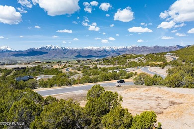 Positioned in a premier location within Red Ledges, Lot 911 is - photo 5