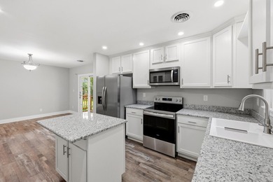 Fully renovated and move-in ready, this beautifully updated 3 - photo 12