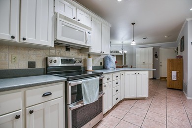 WOW!!! Spacious 4BR/2BA home located on a beautiful tree lined - photo 10