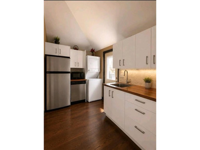 This home is COMPLETELY RENOVATED and FULLY DETACHED on an - photo 6