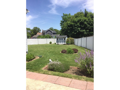 This Charming Expanded Cape set on manicured park-like grounds - photo 9
