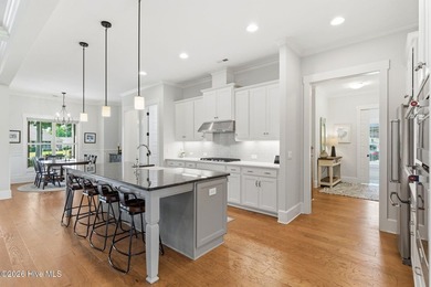 Welcome to this exceptional 4 bedroom, 4 bath custom home in the - photo 11