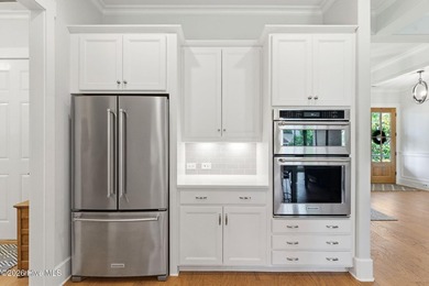Welcome to this exceptional 4 bedroom, 4 bath custom home in the - photo 12