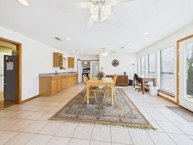 Tucked beneath a canopy of mature trees in the heart of