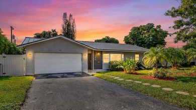 This move-in-ready gem features a new metal roof (2025), full - photo 2