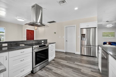 This move-in-ready gem features a new metal roof (2025), full - photo 4