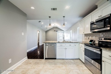 Beautiful, move-in ready home featuring no carpet, hardwood