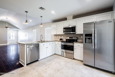 Beautiful, move-in ready home featuring no carpet, hardwood