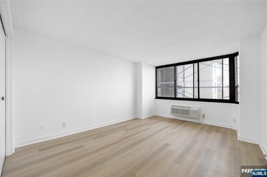 Just renovated. Spacious one bedroom, one bath corner unit. The