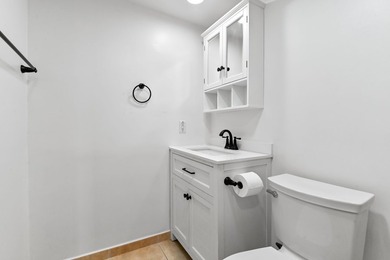 Welcome to this charming 1-bedroom, 1.5-bathroom corner-unit - photo 15