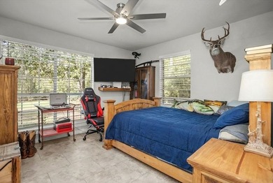 Secluded lakefront living surrounded by towering East Texas - photo 21