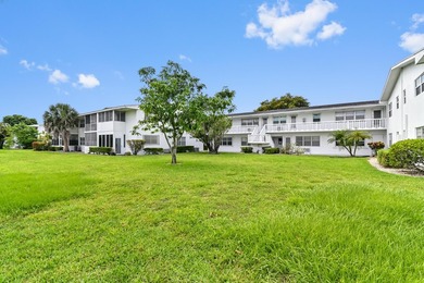 Welcome to this charming 1-bedroom, 1.5-bathroom corner-unit - photo 21