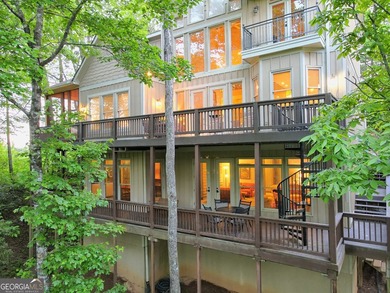 Nestled in the coveted Waterfall at Lake Burton community, this - photo 3