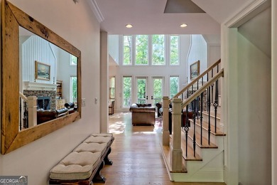 Nestled in the coveted Waterfall at Lake Burton community, this - photo 5