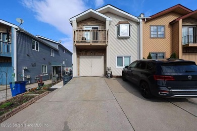 Stunning Two Family Semi-Attached home conveniently located to - photo 1