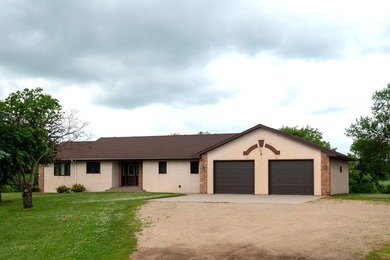This ranch style home with a walkout basement and an extra-large - photo 2