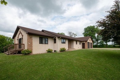 This ranch style home with a walkout basement and an extra-large - photo 3