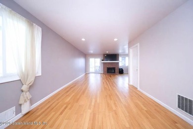 Stunning Two Family Semi-Attached home conveniently located to - photo 5