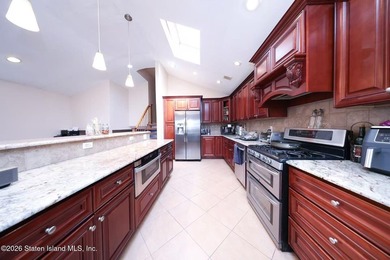 Stunning Two Family Semi-Attached home conveniently located to - photo 9