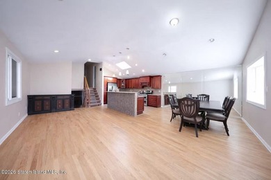 Stunning Two Family Semi-Attached home conveniently located to - photo 10