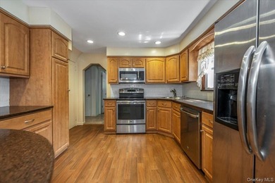 Welcome to this spacious Farm Ranch set on the serene Mill River - photo 8