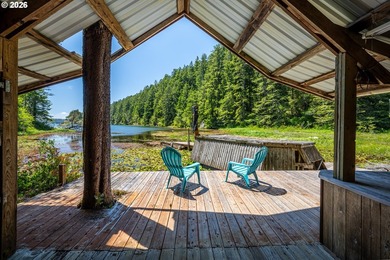 Tucked away in the trees on beautiful Woahink Lake, this rare 1 - photo 16