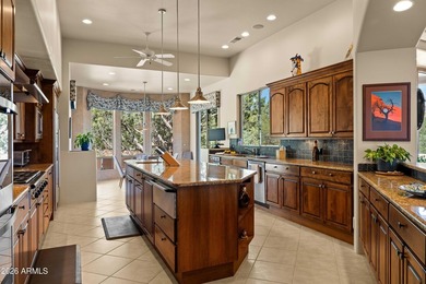 This custom-built residence at 144 Sun Up Ranch Rd is a