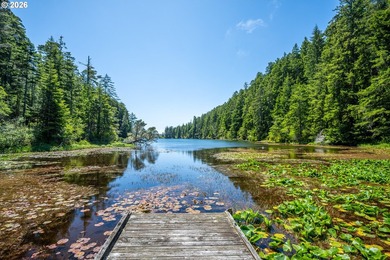 Tucked away in the trees on beautiful Woahink Lake, this rare 1 - photo 20