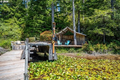 Tucked away in the trees on beautiful Woahink Lake, this rare 1 - photo 21