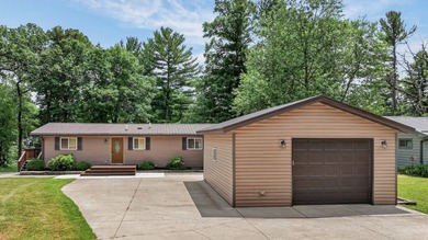 Lakefront Living on Tainter Lake. Discover this beautifully - photo 2