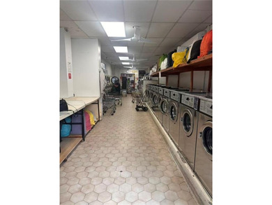 Beautifully renovated brick mixed-use property located in the - photo 4