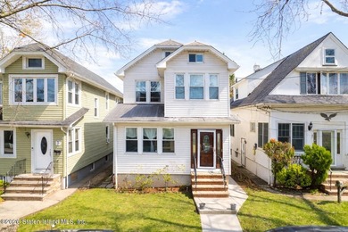 Welcome to this charming two-family home ideally located in - photo 1