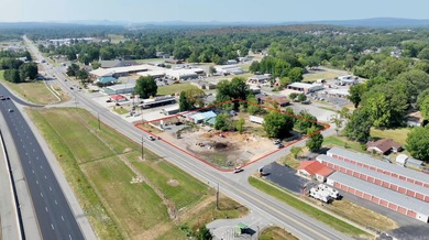 Prime 4.3 acre corner lot with highway frontage in the rapidly - photo 2
