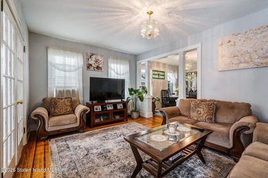 Welcome to this charming two-family home ideally located in - photo 2