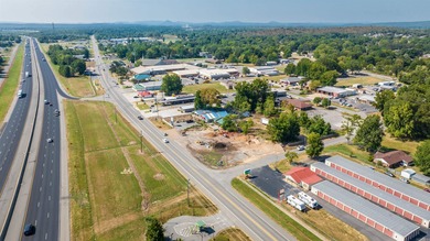 Prime 4.3 acre corner lot with highway frontage in the rapidly - photo 3