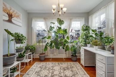 Welcome to this charming two-family home ideally located in - photo 6