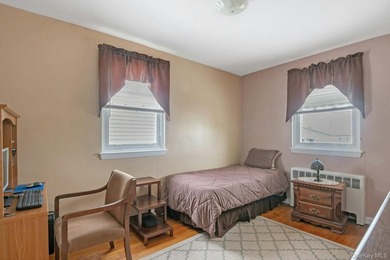 This well-maintained brick home offers a spacious and functional - photo 13